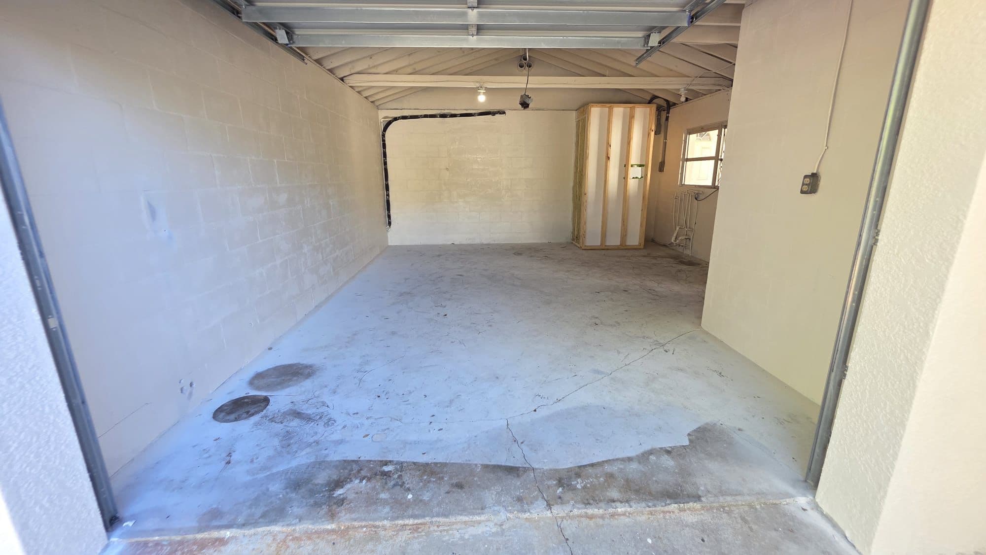Garage epoxy flooring before